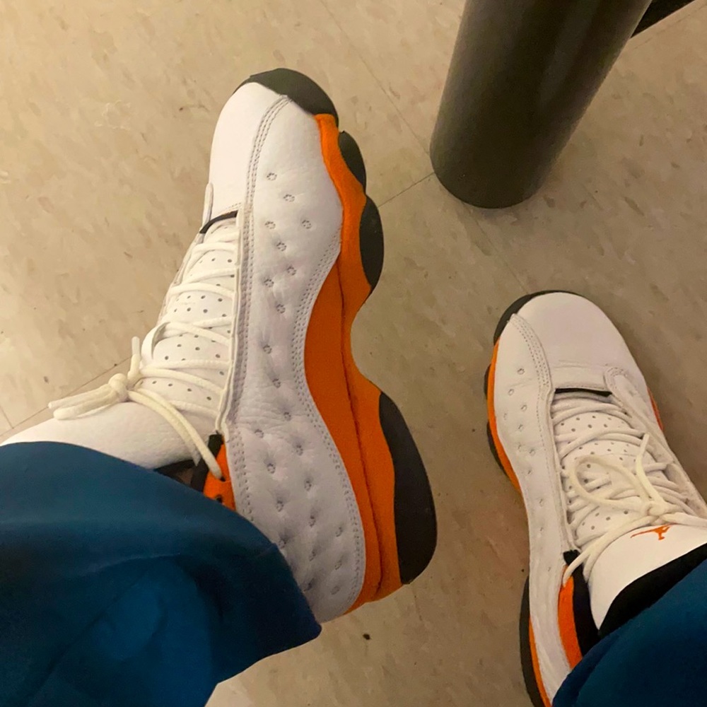 White and orange 13s Jordan’s